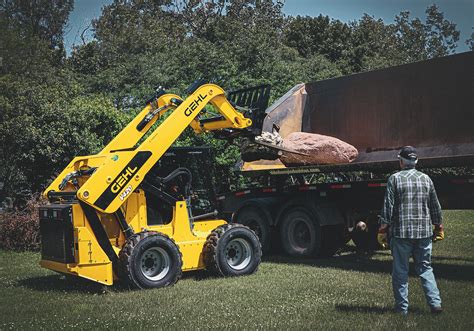 skid steer max lift|vertical lift skid steer.